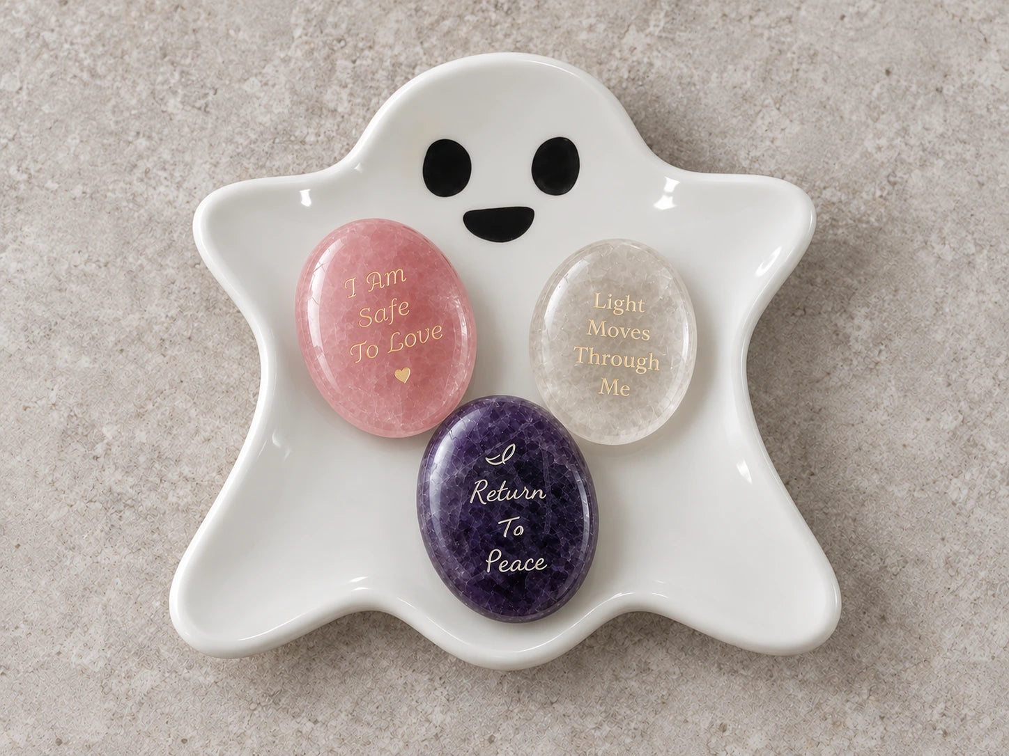 Styling illustration: the three Soft Return stones arranged on the complimentary ghost tray